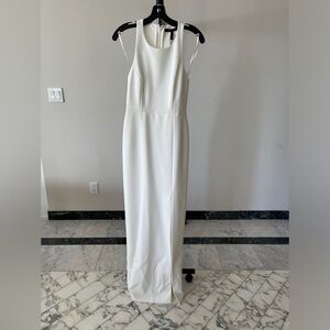 Bcbg woman’s white dress. Size 2. New with tags. Never worn!
